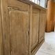 Large row of solid oak loom sliding doors