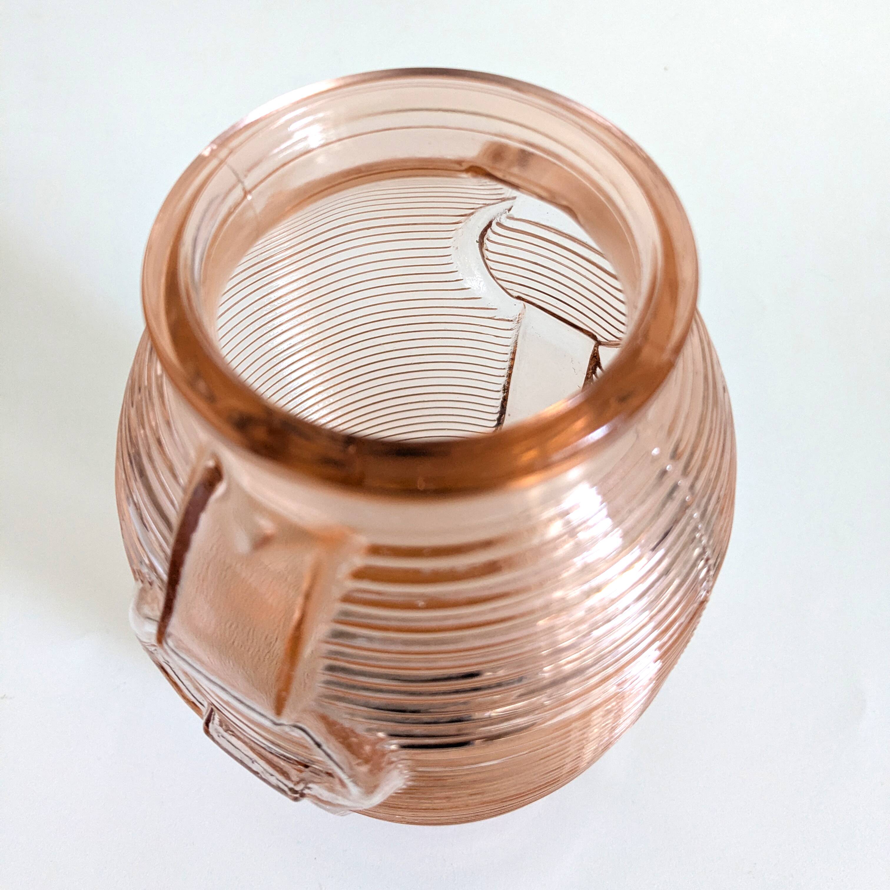 Pair of Art Deco pink moulded glass vases