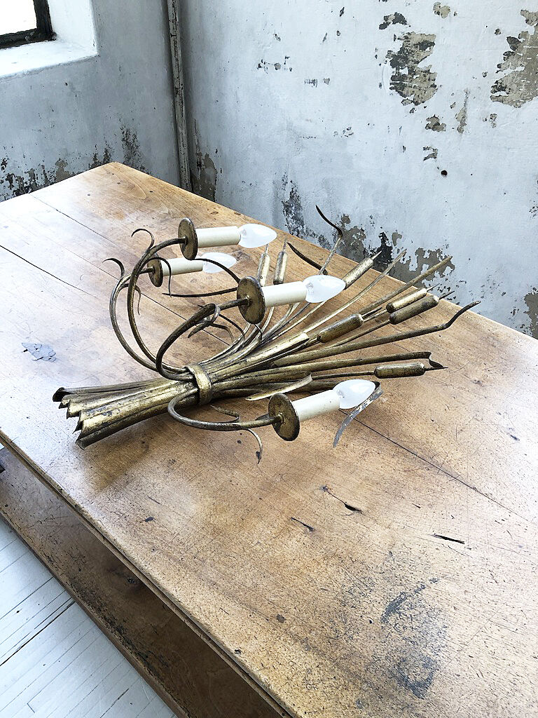 Gold metal reeds flowering wall light