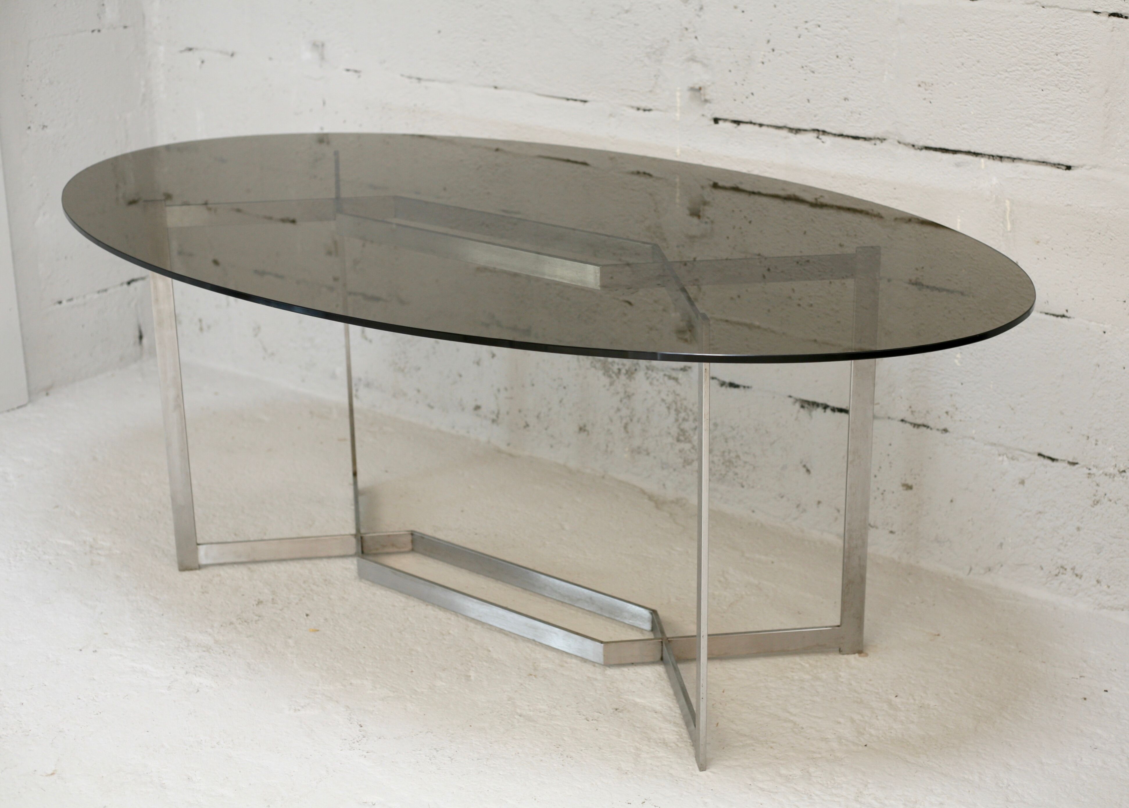 Table de Paul Legard, édition DOM, aluminium brossé et dalle elliptique de verre fumé, France, circa