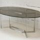 Table de Paul Legard, édition DOM, aluminium brossé et dalle elliptique de verre fumé, France, circa