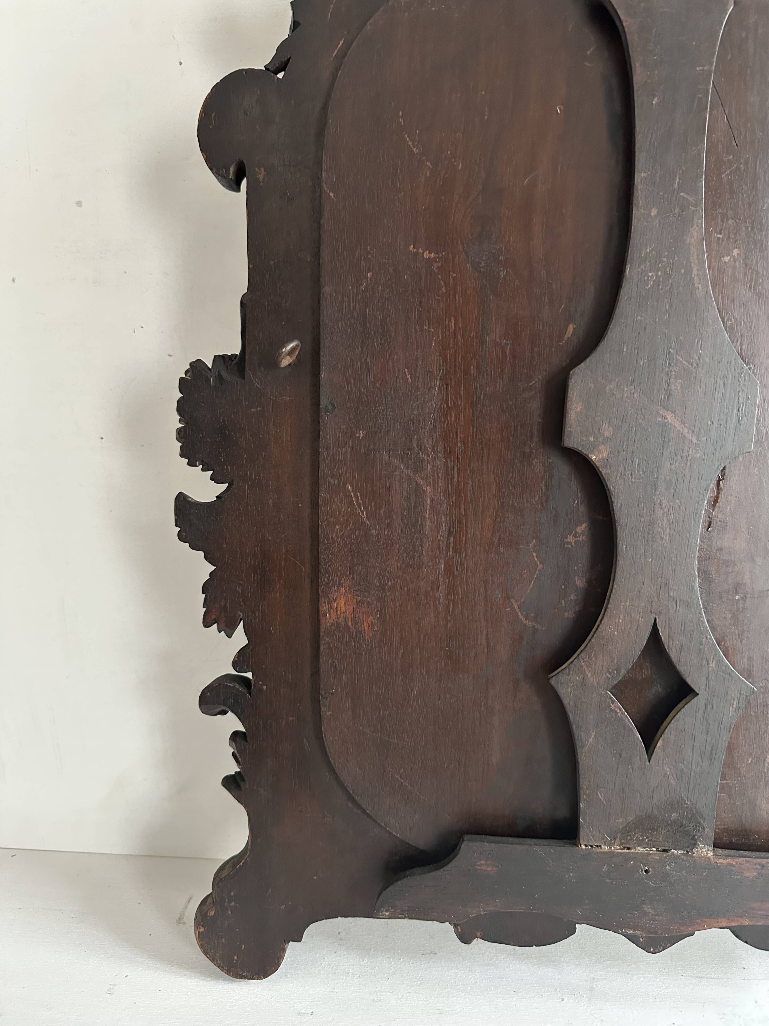 Napoleon III mirror in carved blackened wood, 19th century