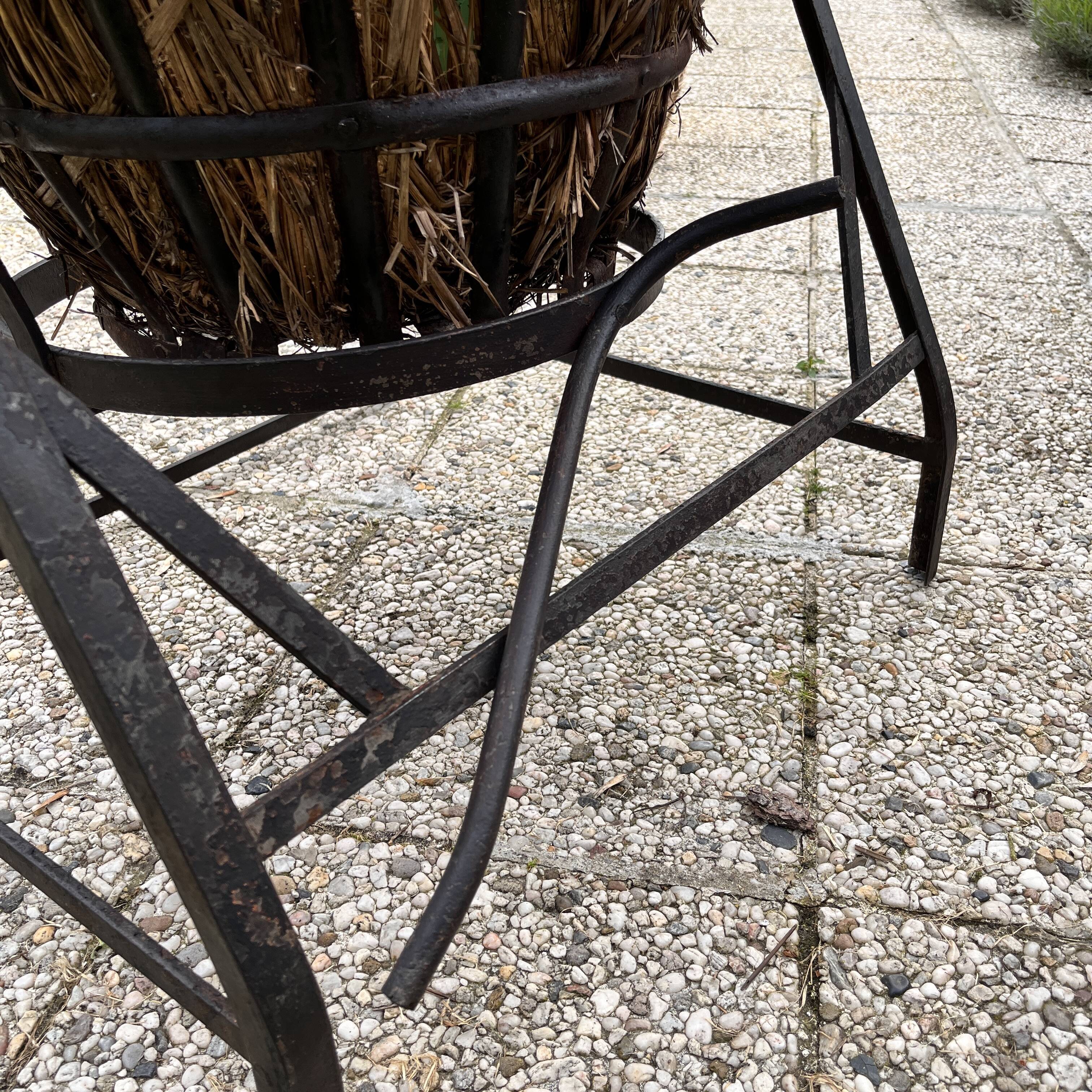 Demijohn on steel rocker