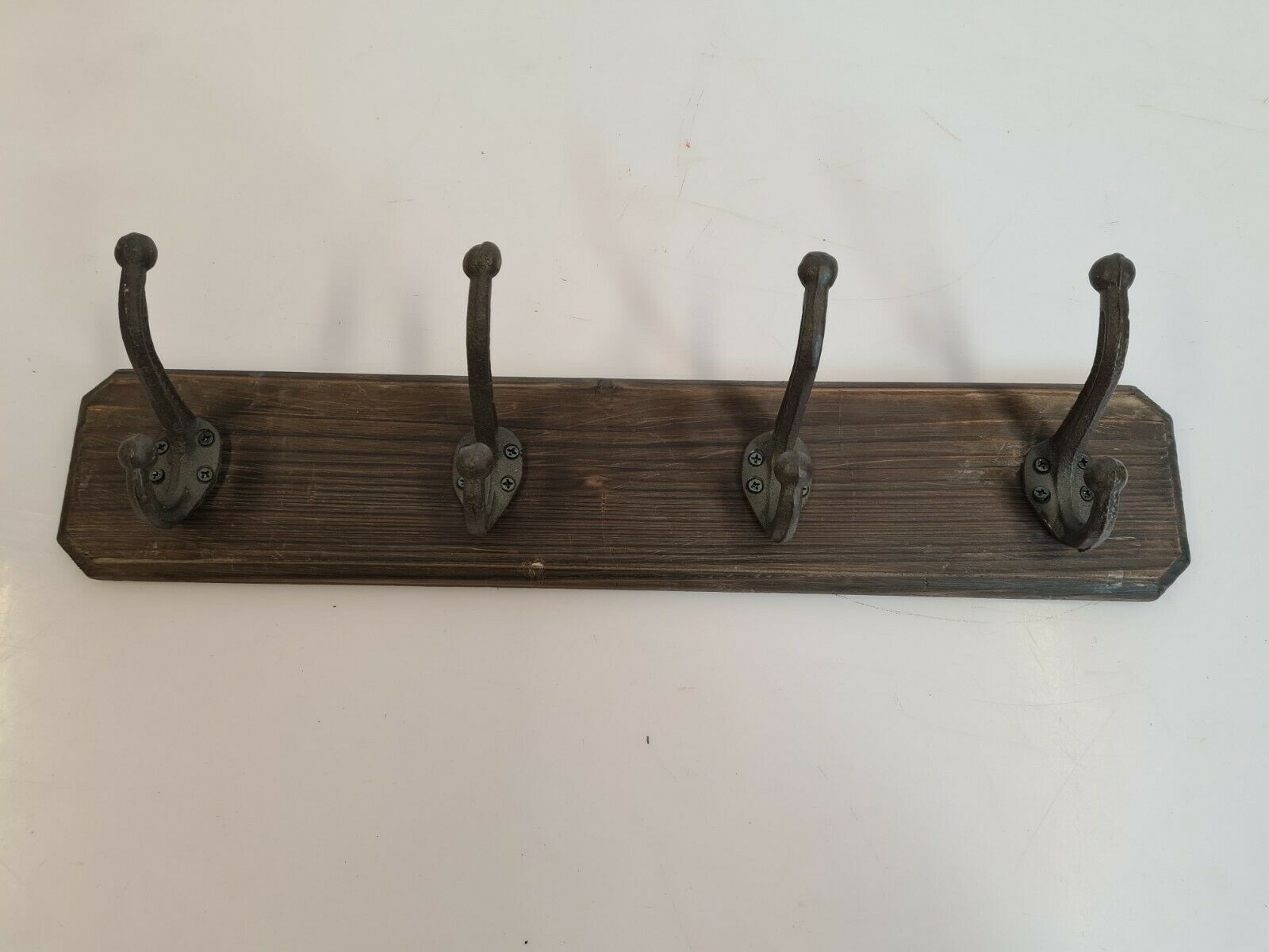 Wooden coat rack and cast iron hooks