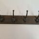 Wooden coat rack and cast iron hooks