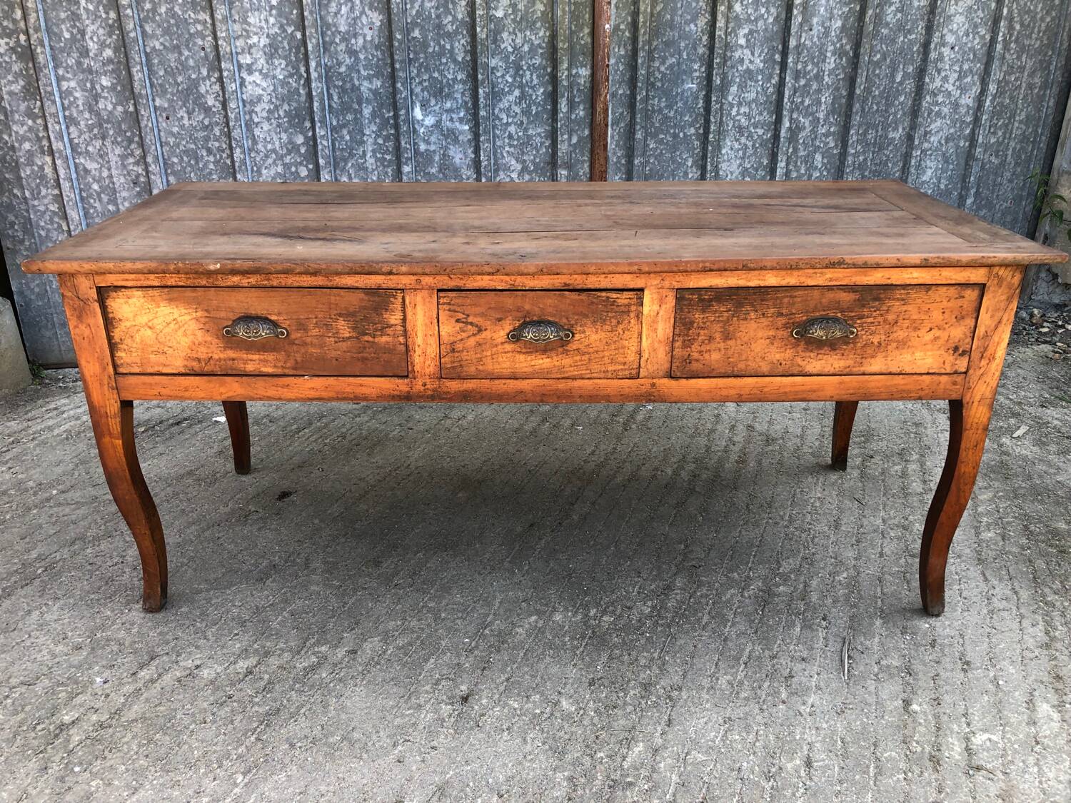 Antique solid cherry farmhouse table with 3 drawers and 2 pulls