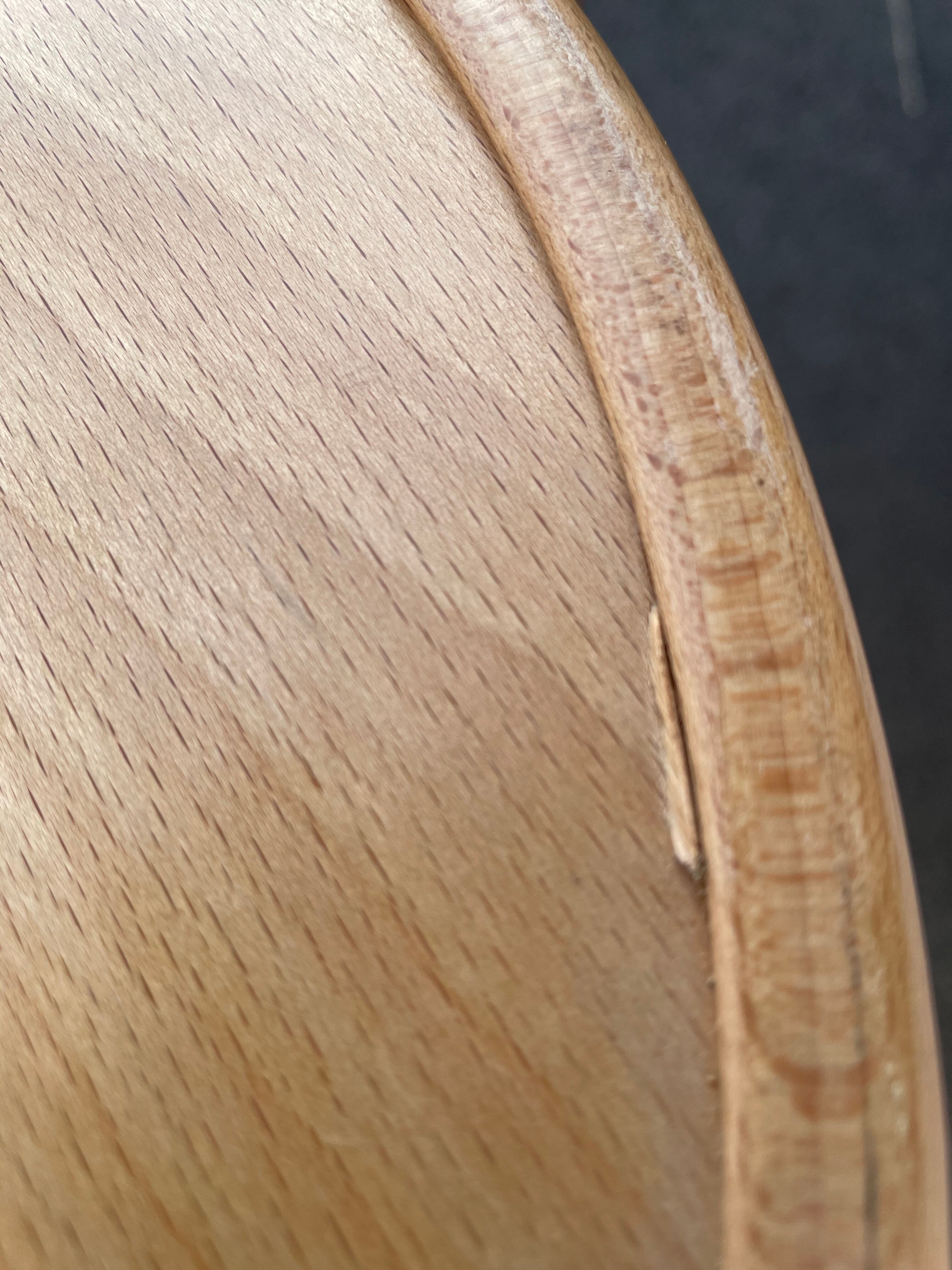 Curved wooden bar stool