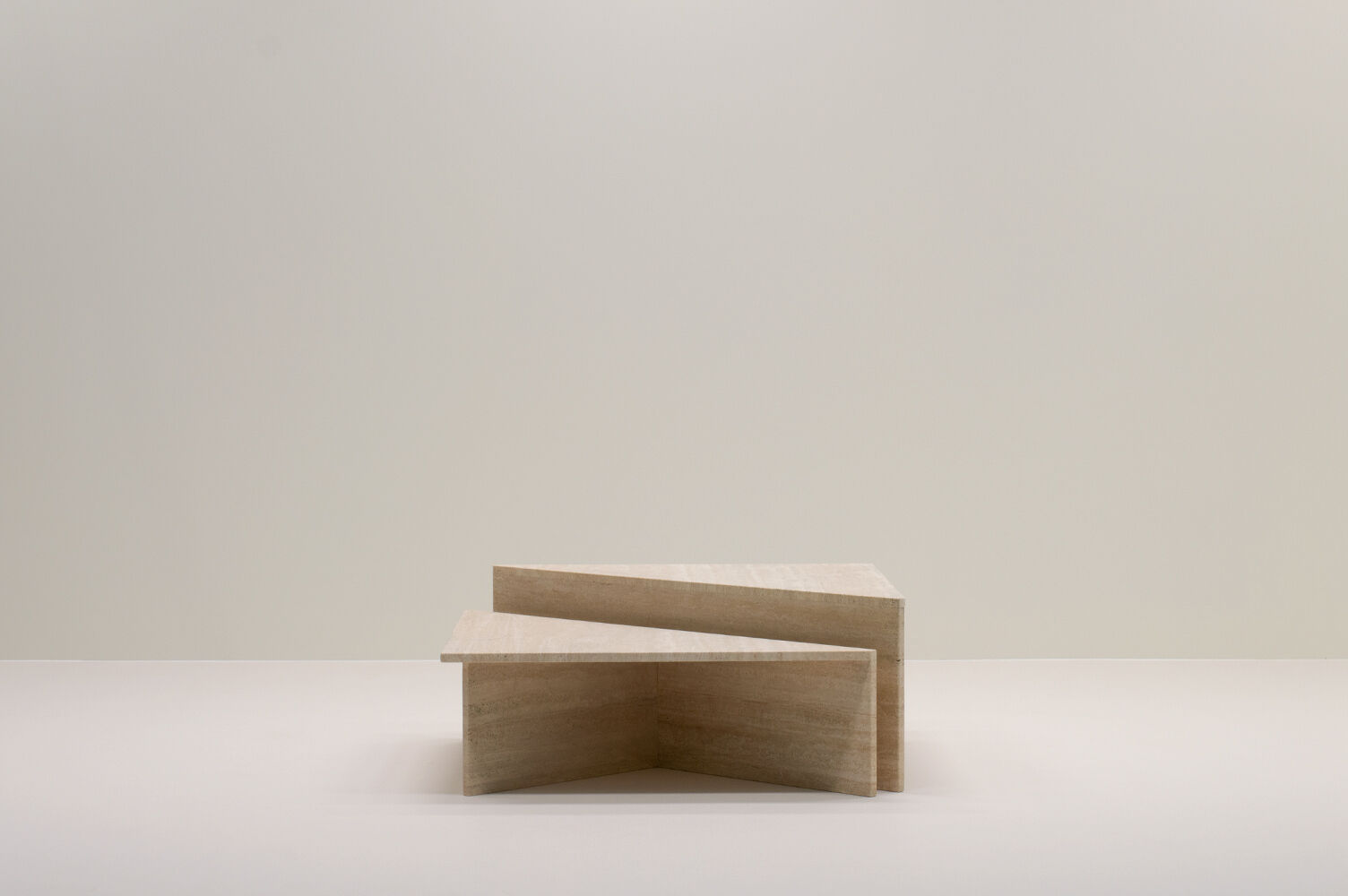 Up&Up triangle travertine coffee table, Italy 70s