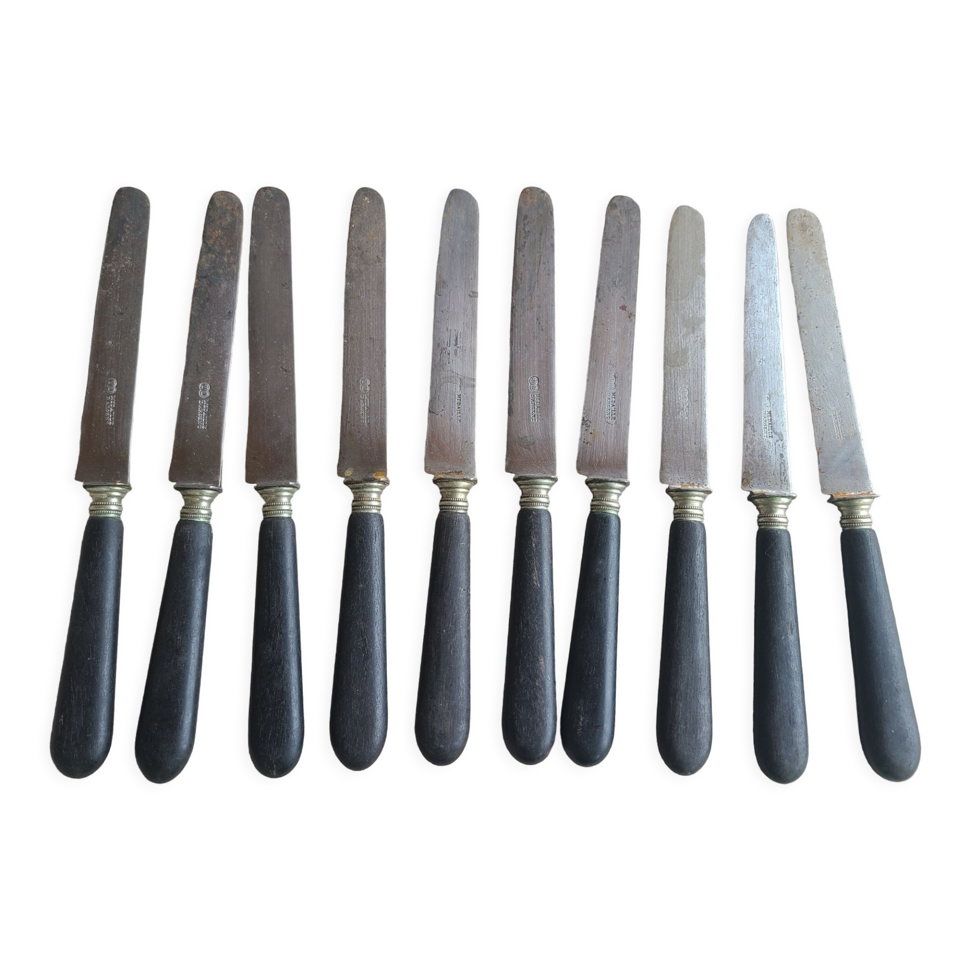 Antique knives blackened wooden handle