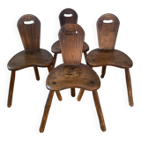 4 brutalist farm tripod chairs