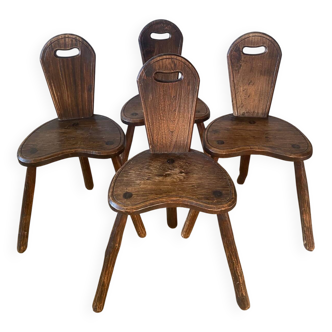 4 brutalist farm tripod chairs