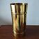 Vintage 1970s Italian umbrella stand in hammered brass, signed.
