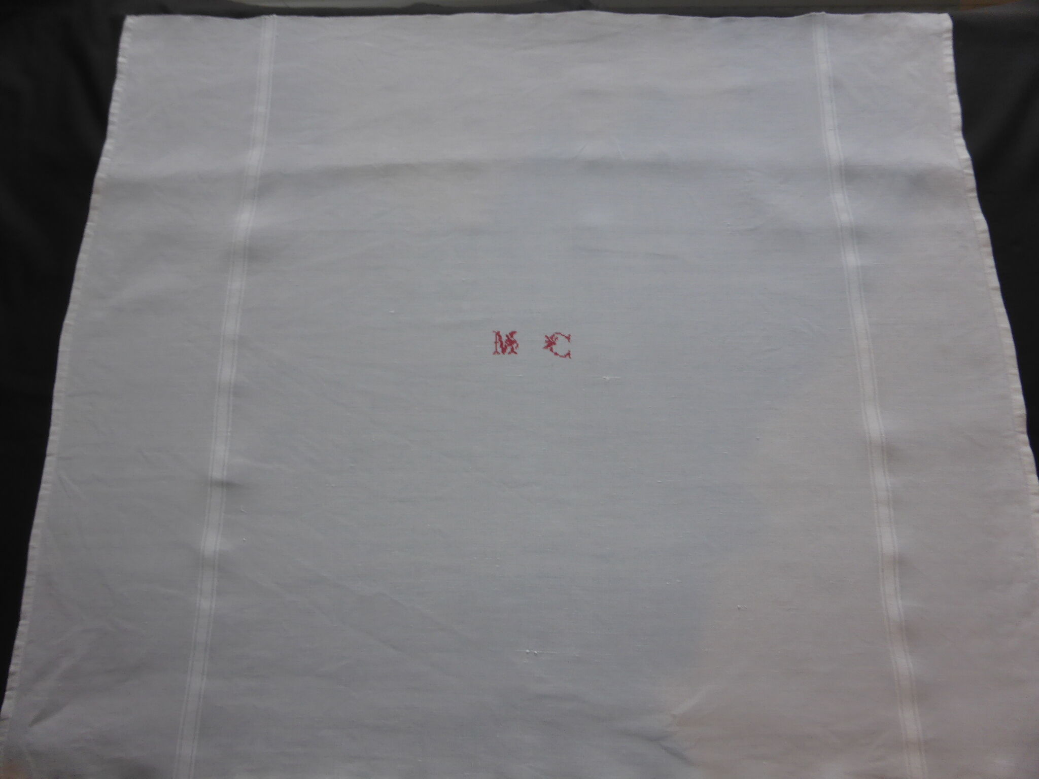 9 old linen towels embroidered MC with red thread