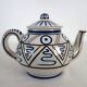 Old ceramic tea service with hand decor