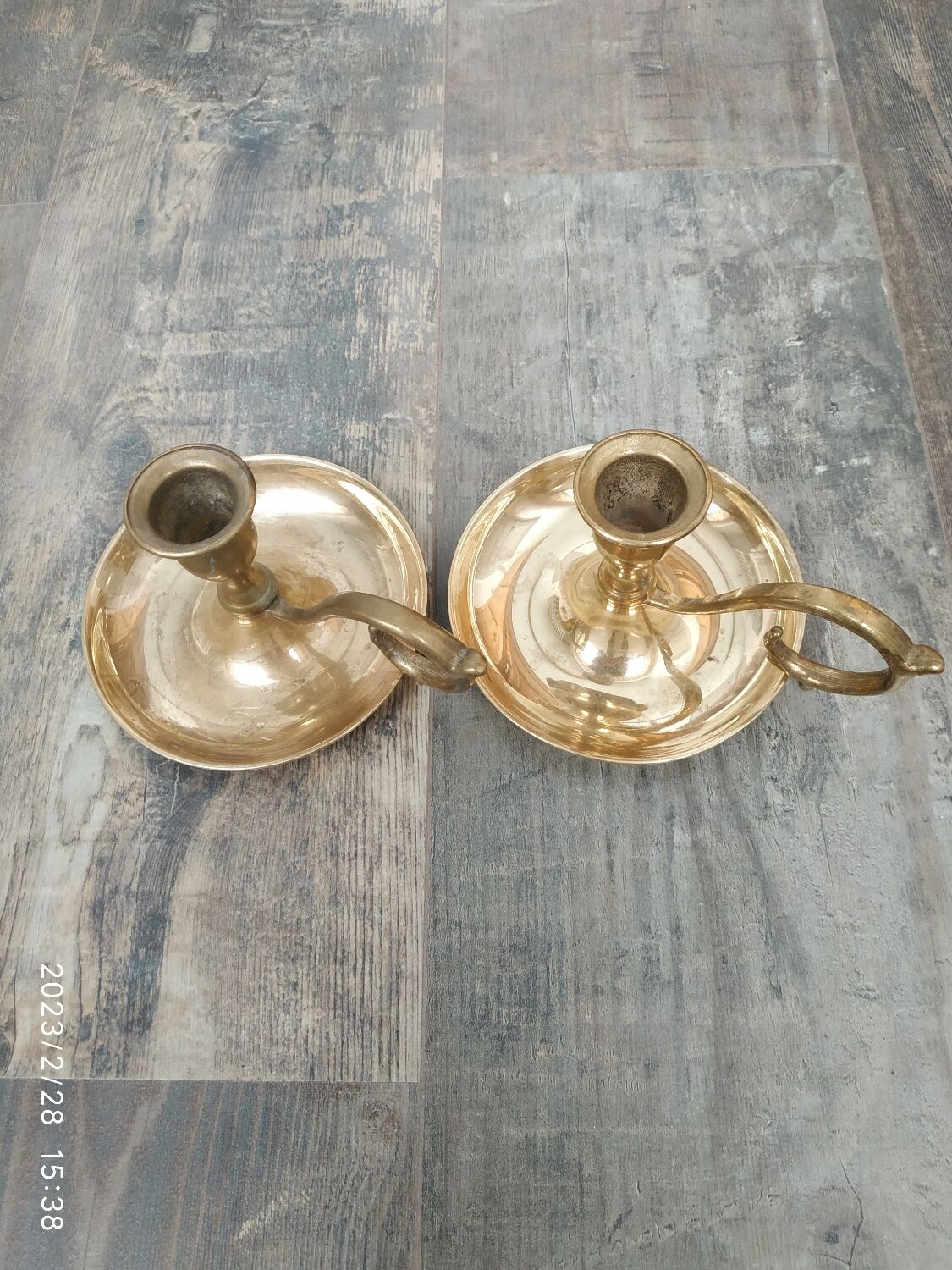 Duo of brass candle holders