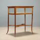 Showcase table in mahogany with bevelled glass.