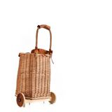 Wicker basket on wheels with leather flap