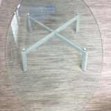 Design coffee table in beveled glass and steel foot