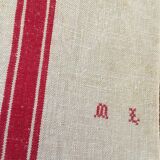 Two old, dismatched dishcloths