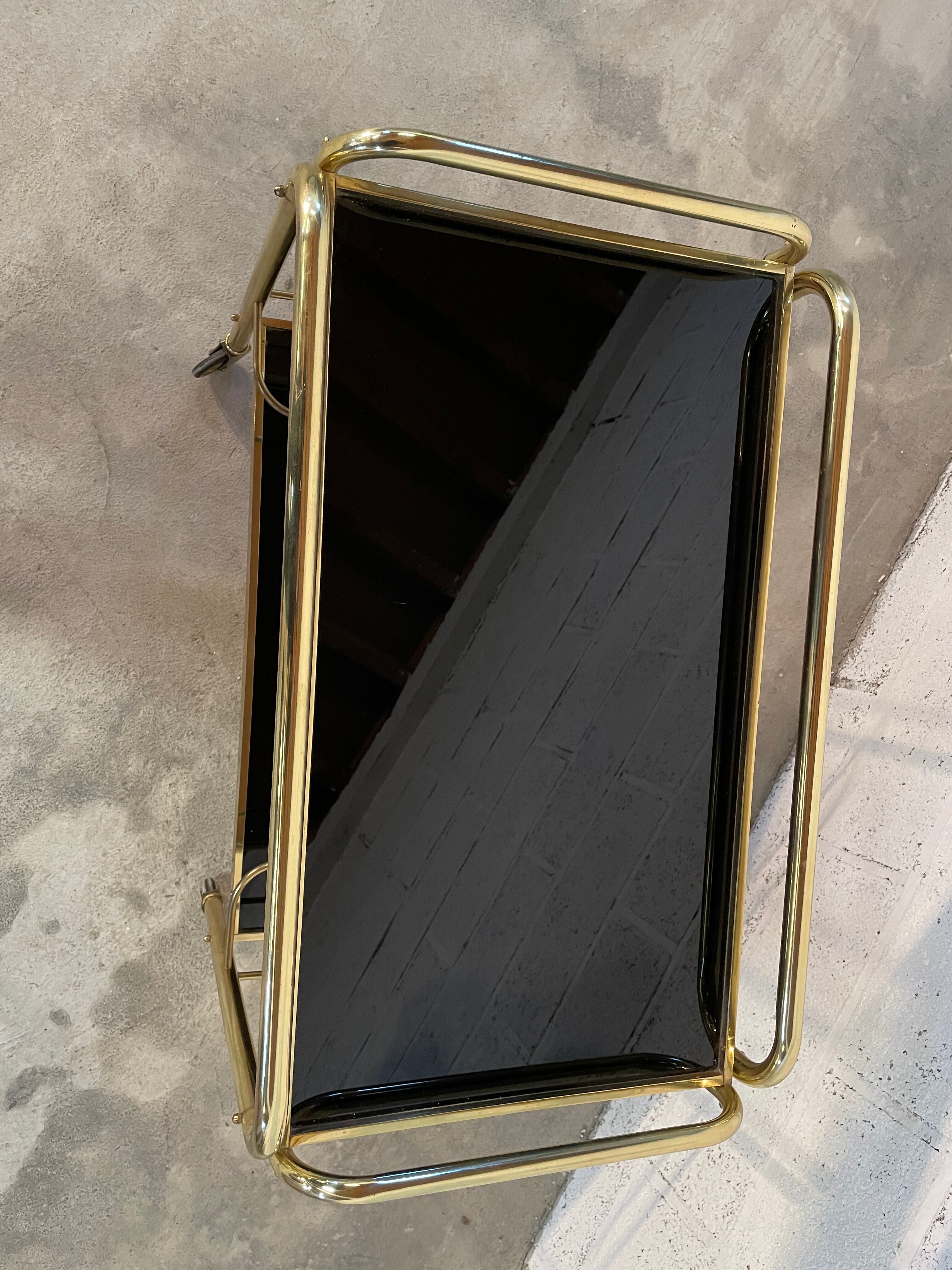 Vintage golden and black rolling service 1970s