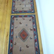 Pair of 60 x 120 Peruvian wool rugs