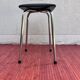 Tabouret vintage en skaï noir