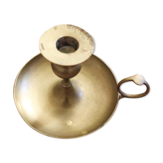 Large hand candlestick in gilded brass