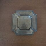 Brass pocket emptier