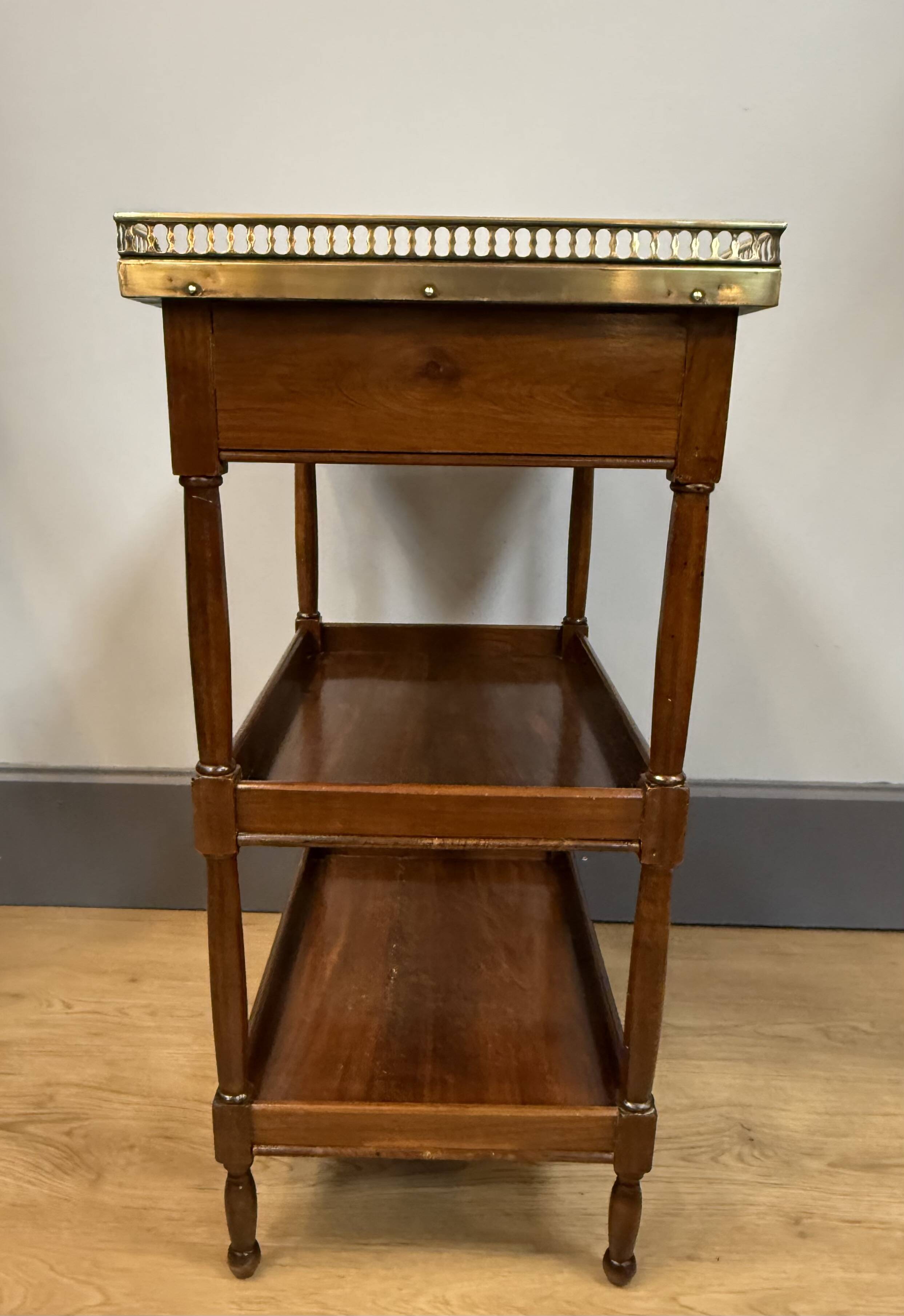 Small mahogany side table in Louis XVI style.