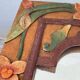Miroir en bois, sculpté à décor de fleurs
