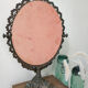 Old mirror on foot metal 30x46cm