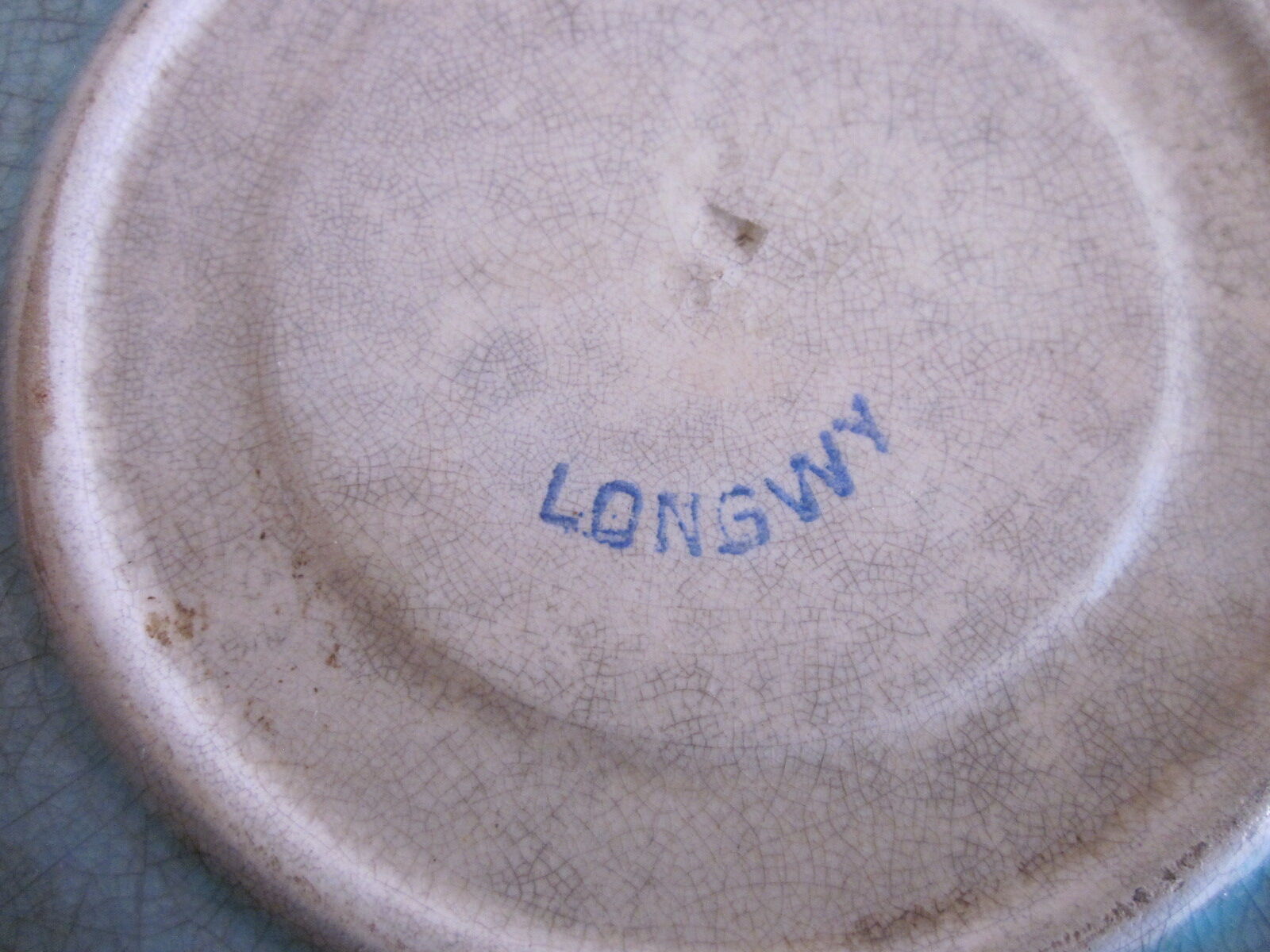 Saucer in enamels of Longwy