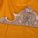 Carved wooden pediment