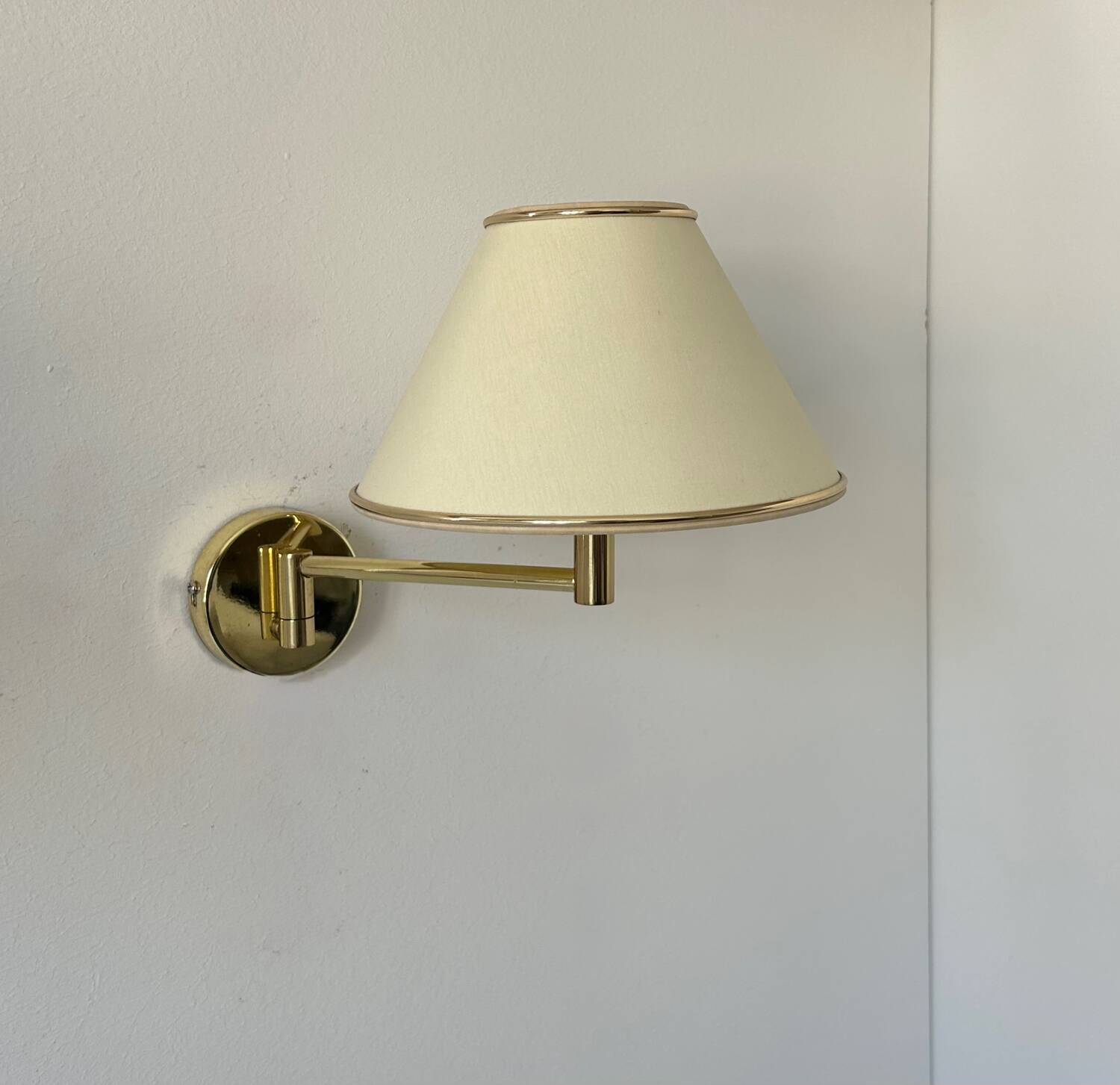 Vintage adjustable wall lamp, brass and beige fabric, France 1970