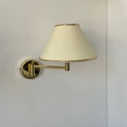 Vintage adjustable wall lamp, brass and beige fabric, France 1970