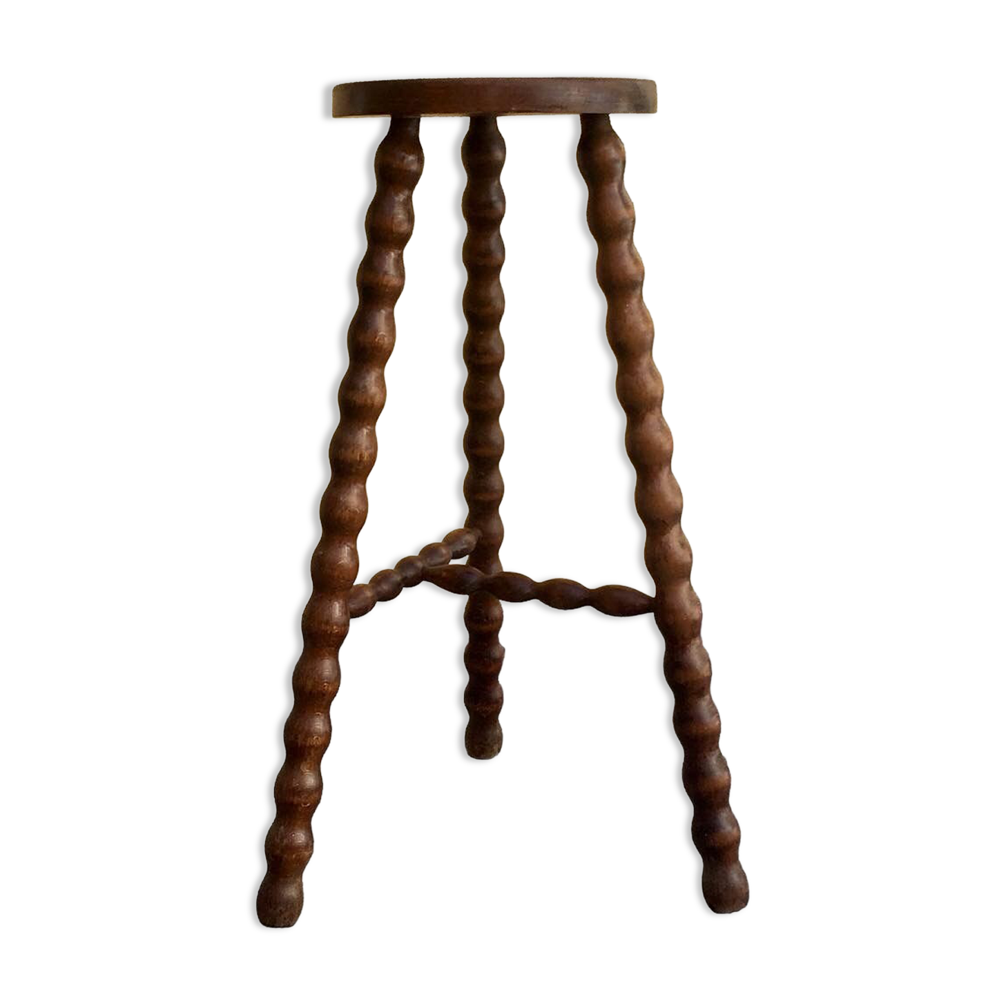 High tripod stool.