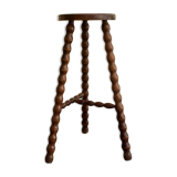 High tripod stool.