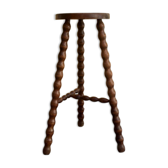 High tripod stool.