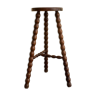 High tripod stool.