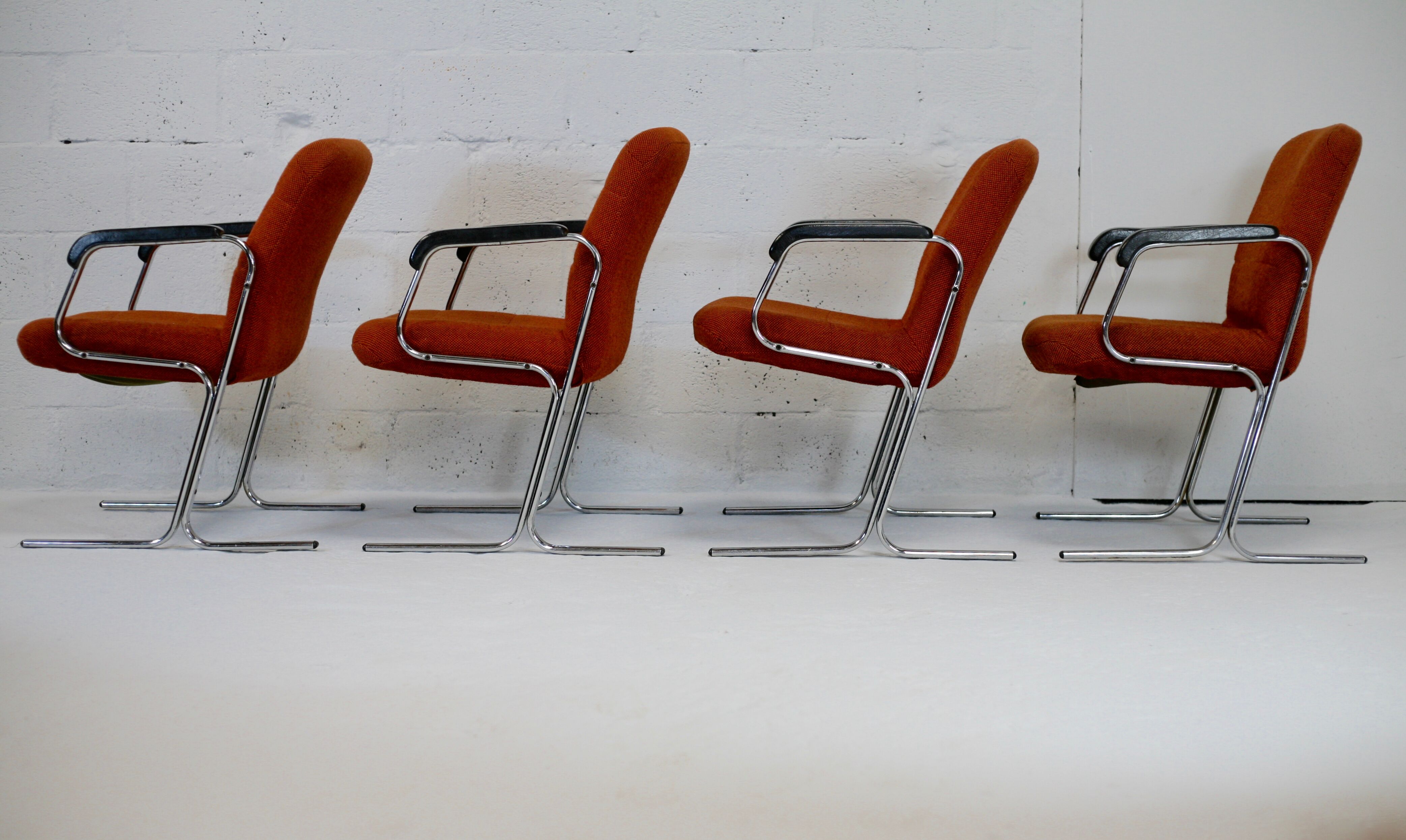 4 "space age" armchairs, chrome steel base