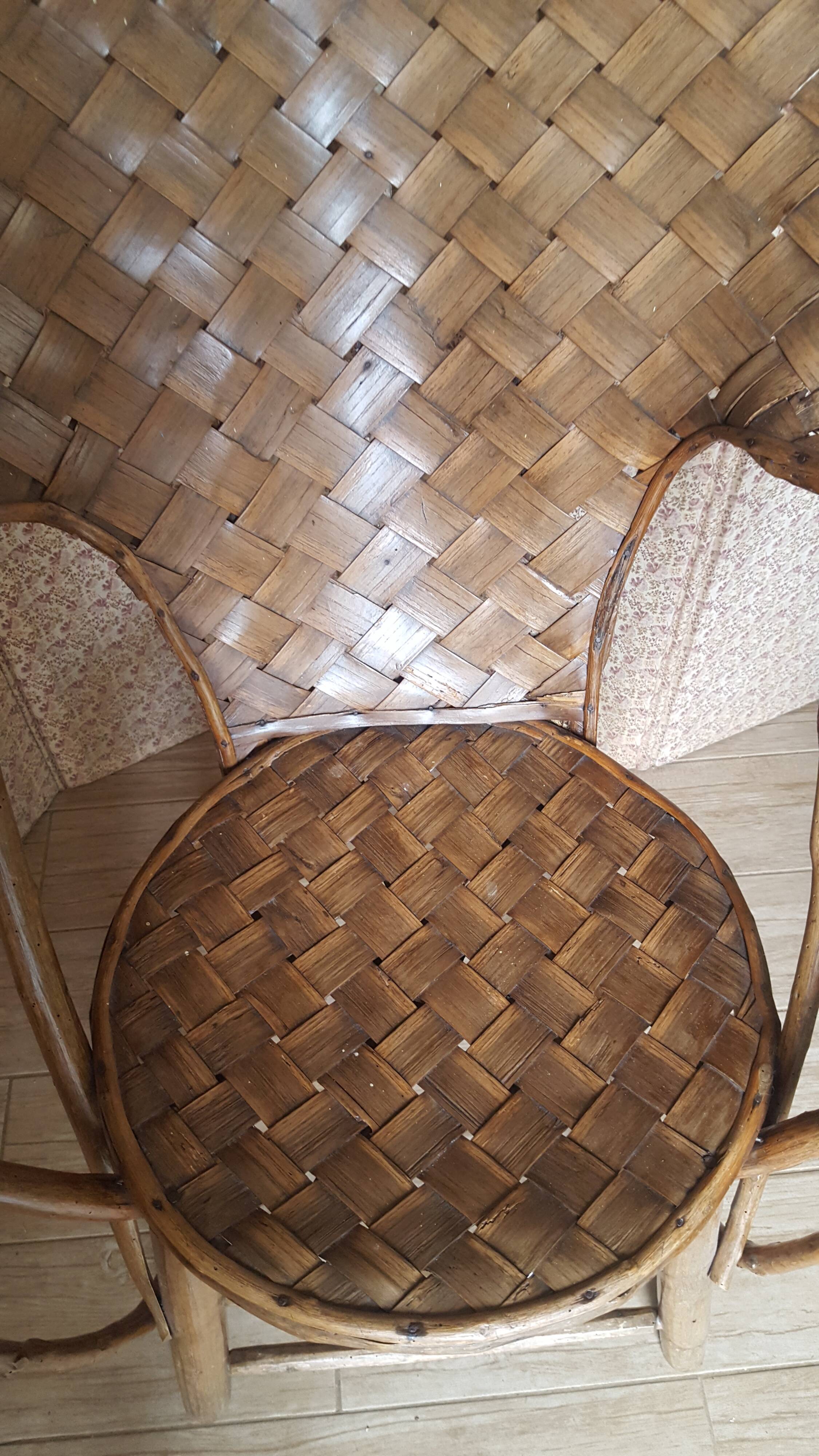 Old chair in braided chestnut