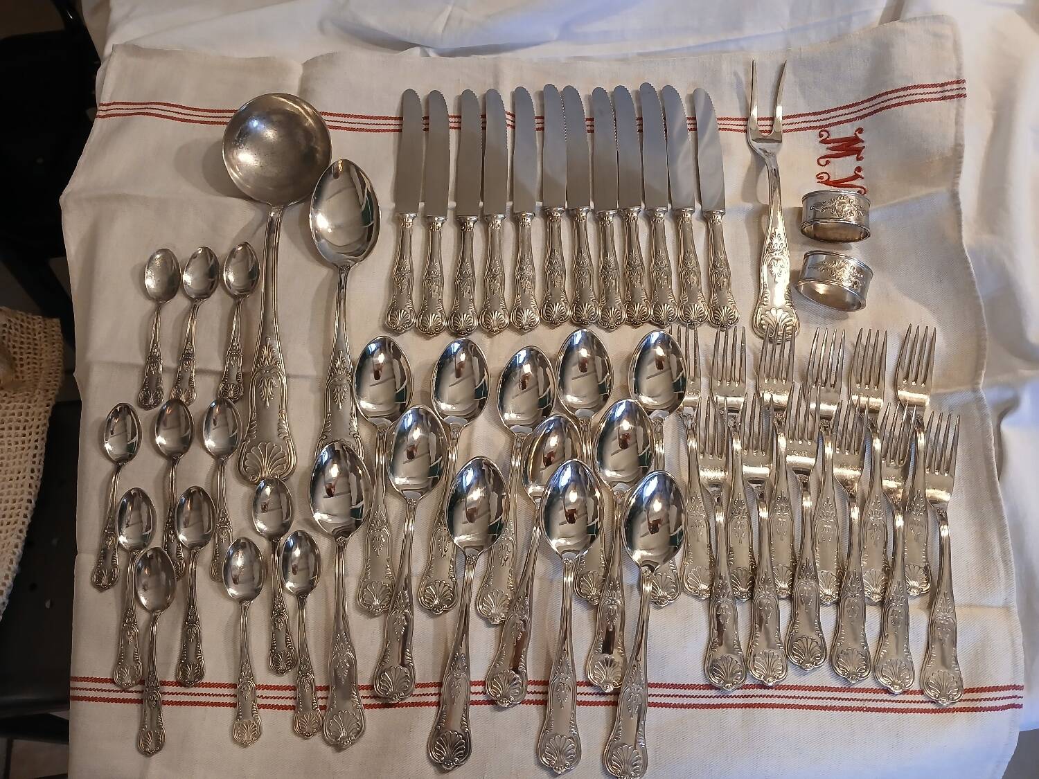 Antique flatware set for 51 place settings