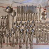 Antique flatware set for 51 place settings