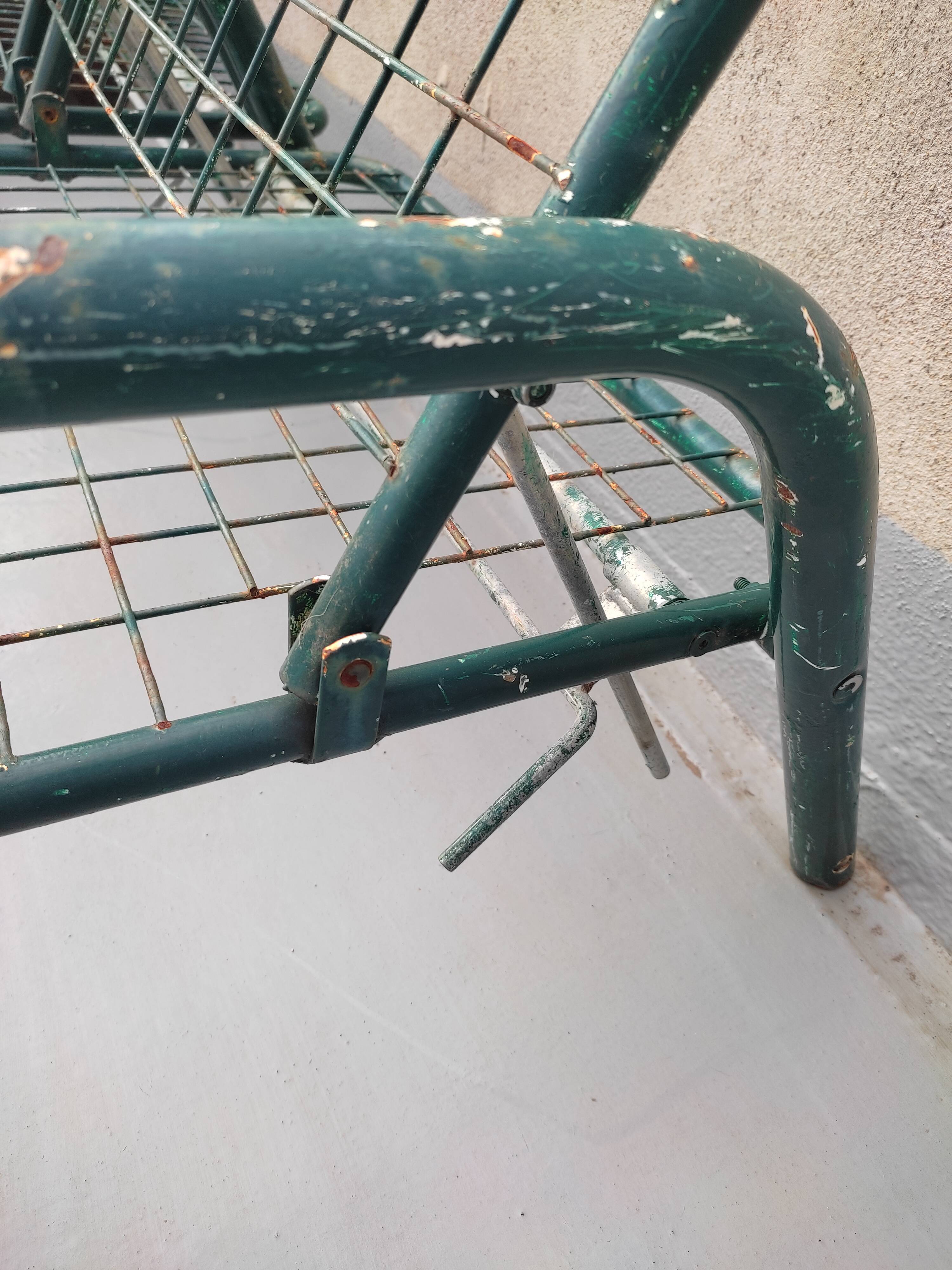 Pair of metal deckchairs