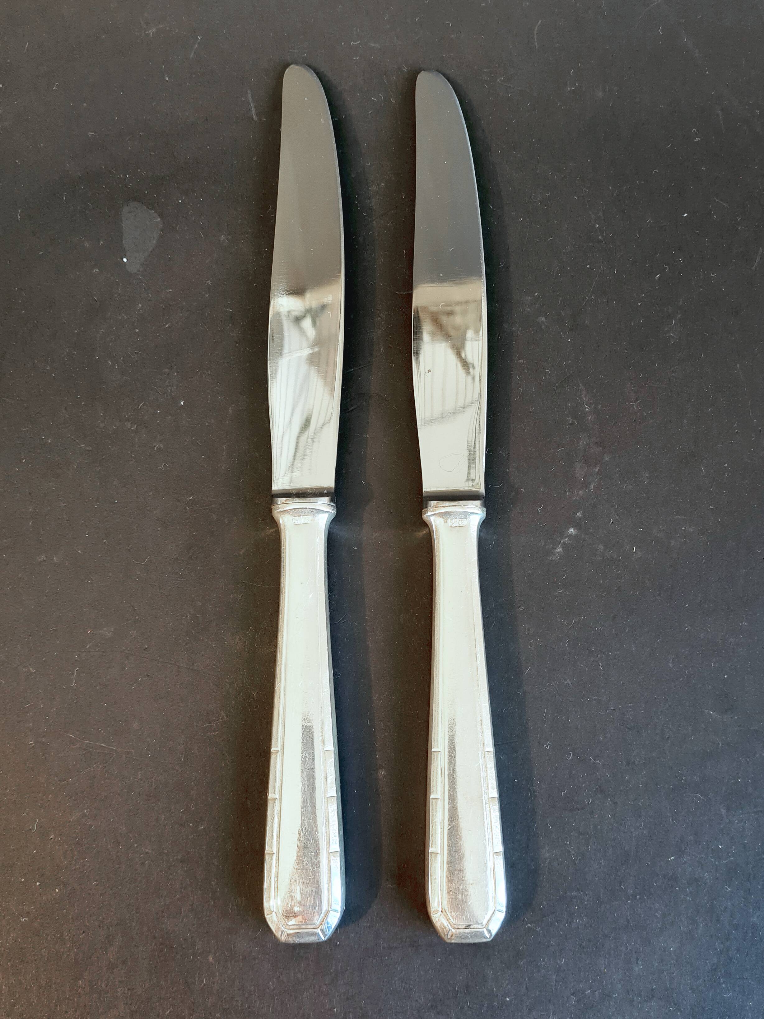 Duo of Christofle knives, "Tosca" model, in Alfenide
