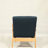 Fauteuil vintage scandinave bleu marin bouclé design moderne milieu siècle