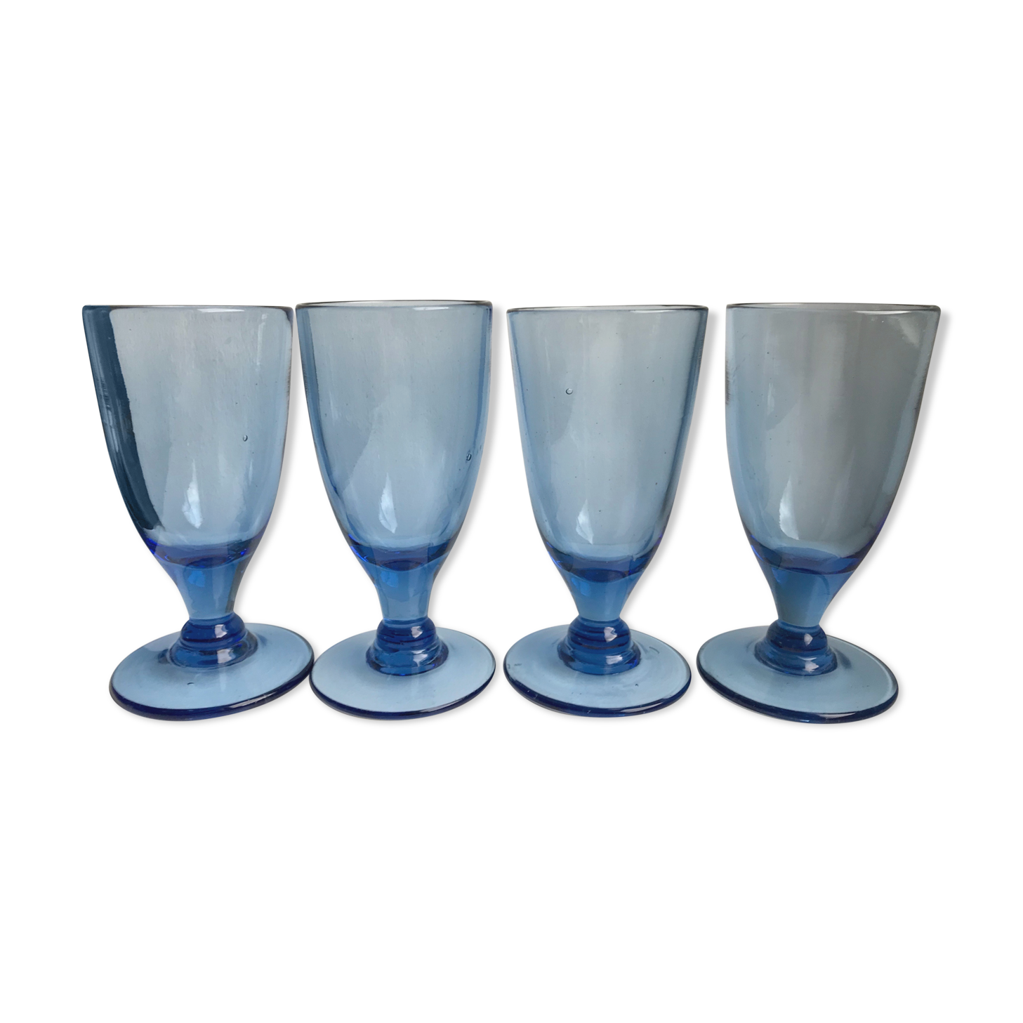 Set of 4 20s blue molded glass foot glasses