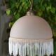Lustrous suspension in glass paste, glass and ceramic pendants.