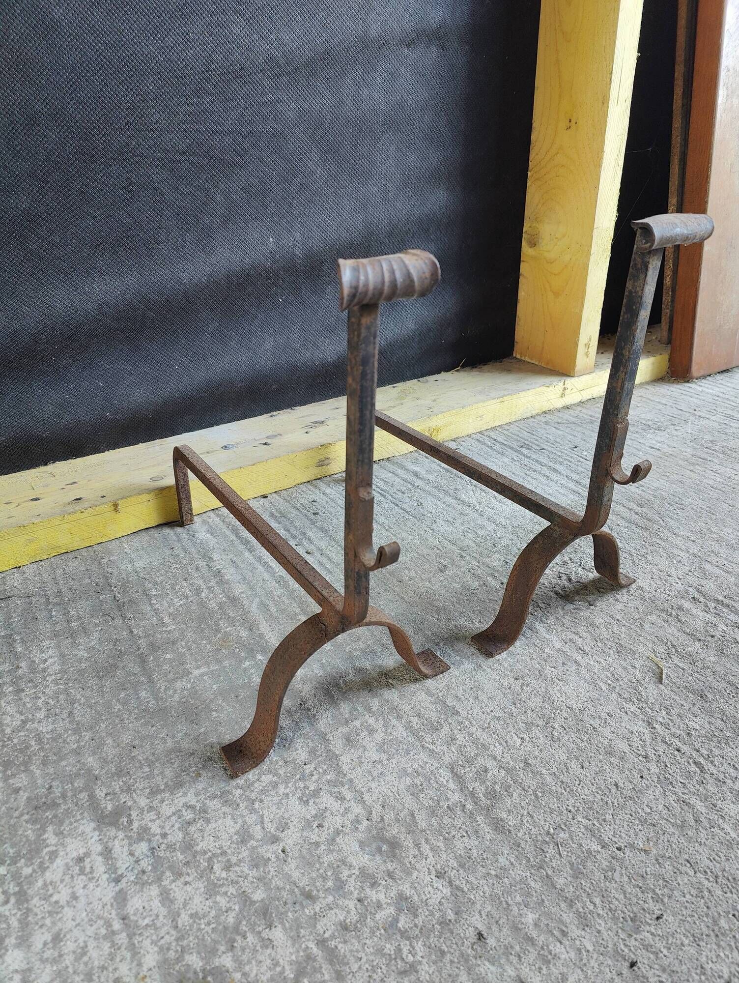 Pair of fire dogs - wrought iron