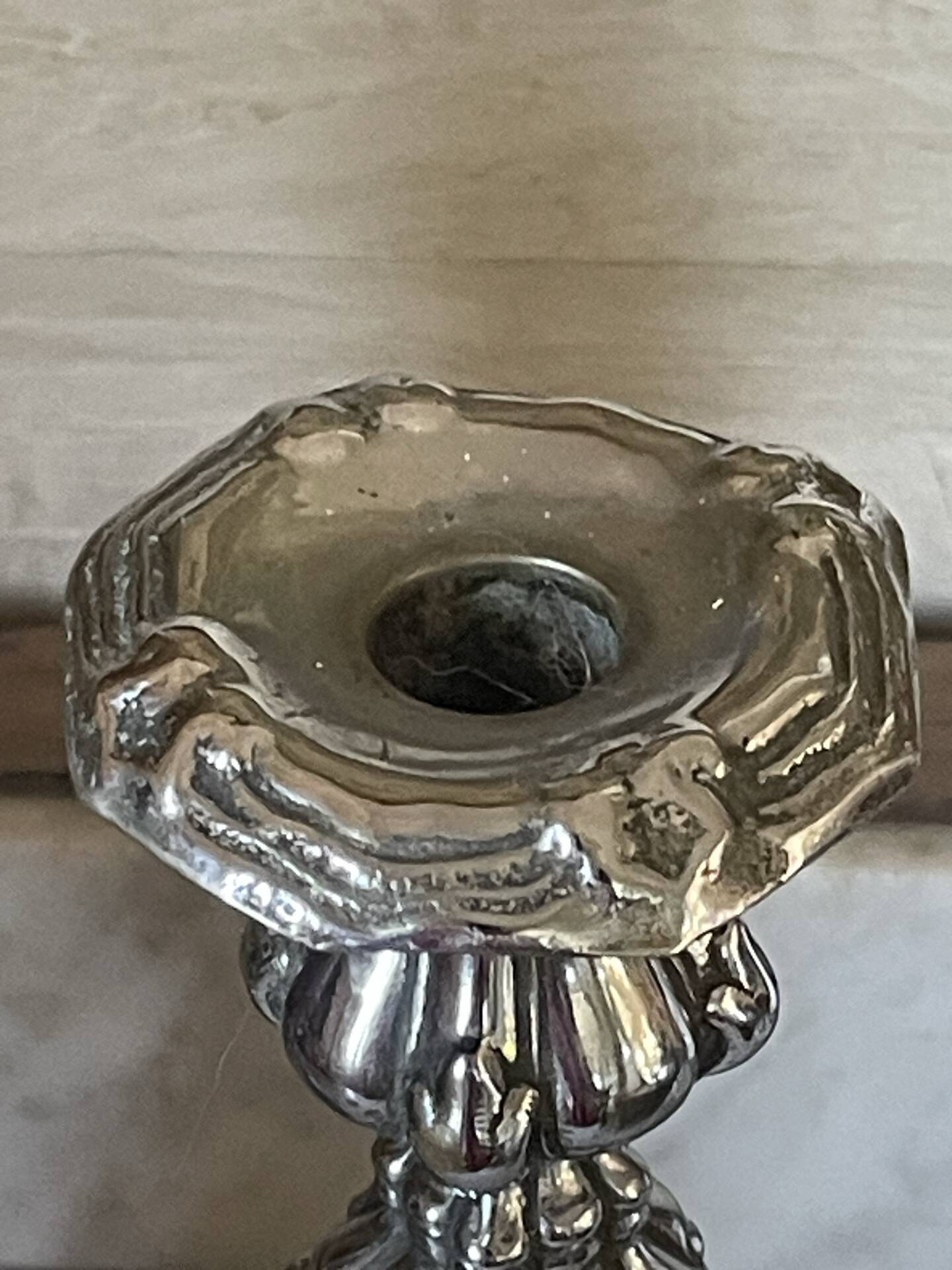 Pair of rococo silver-plated candlesticks